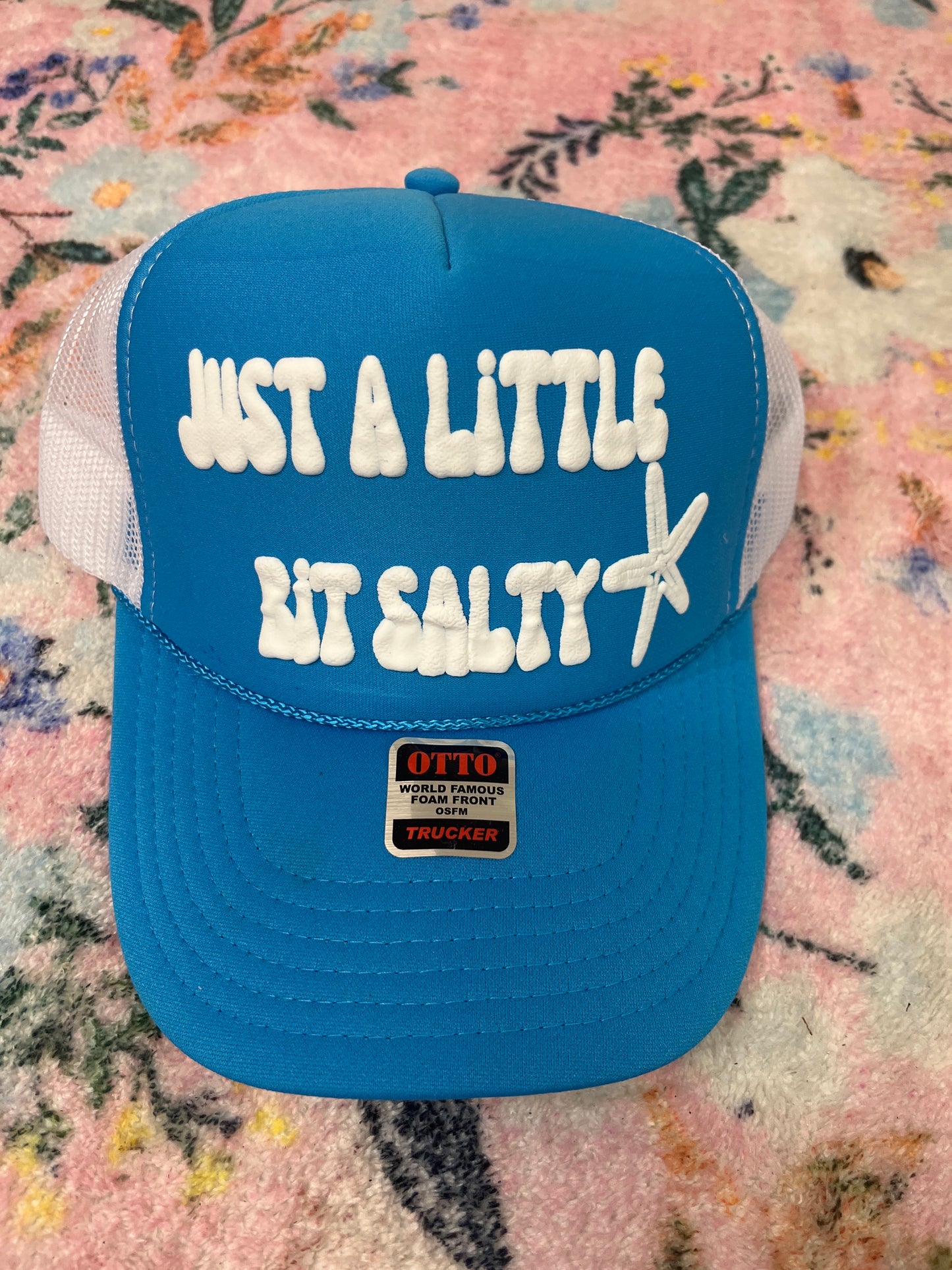 Oopsie little bit salty puff trucker hat