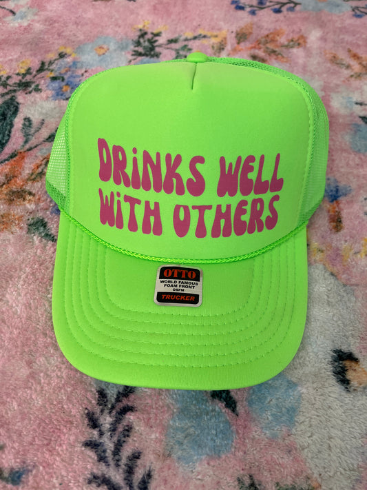 Oopsie drinks well with others trucker hat