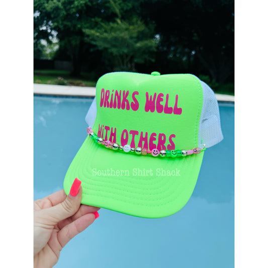 Drinks well with others | trucker hat with hat charm