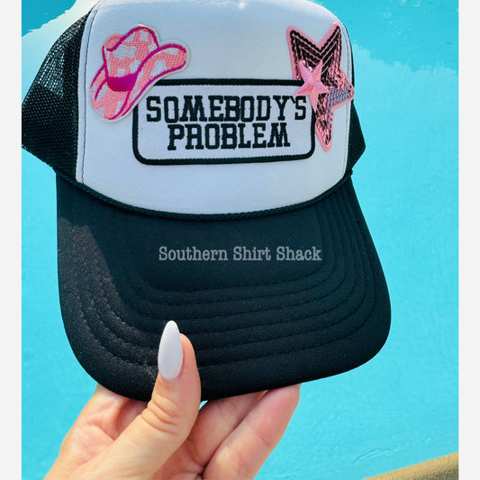 Somebody’s Problem trucker hat