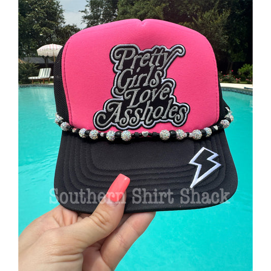 Pretty Girls love Assholes | Trucker Hat with Charm