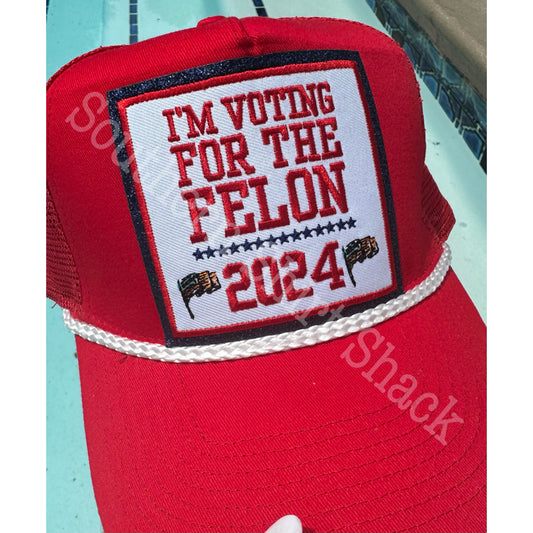 Voting for the Felon trucker hat