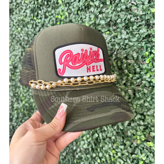 Raisin’ Hell Camo Trucker Hat